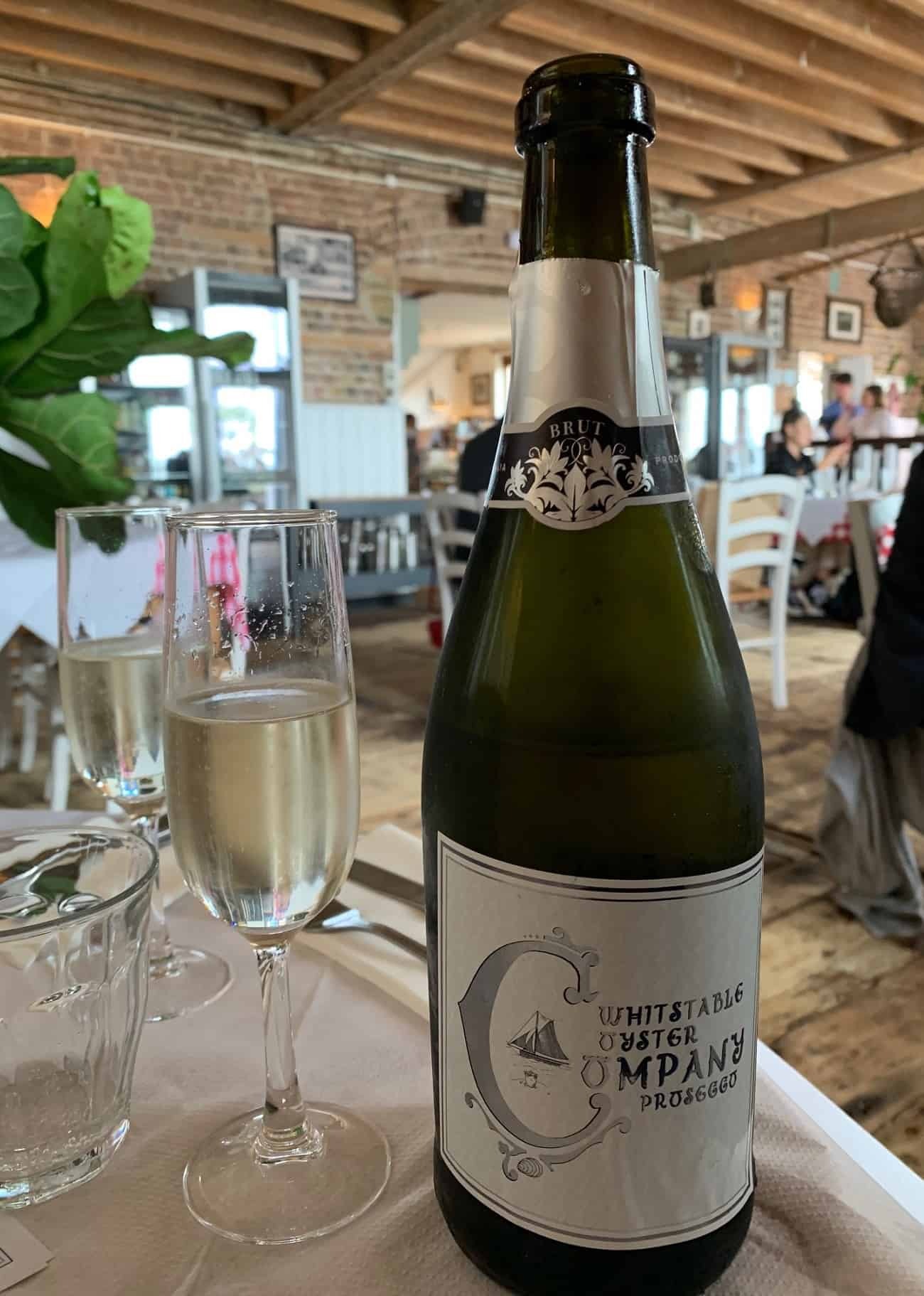 Bottle of branded Prosecco at Whitstable Oyster Company 