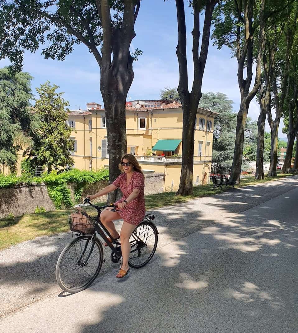 Kirsty on a bicycle in Lucca