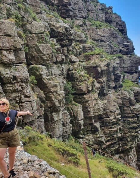 Posing with arms outstretched on Table Mountain